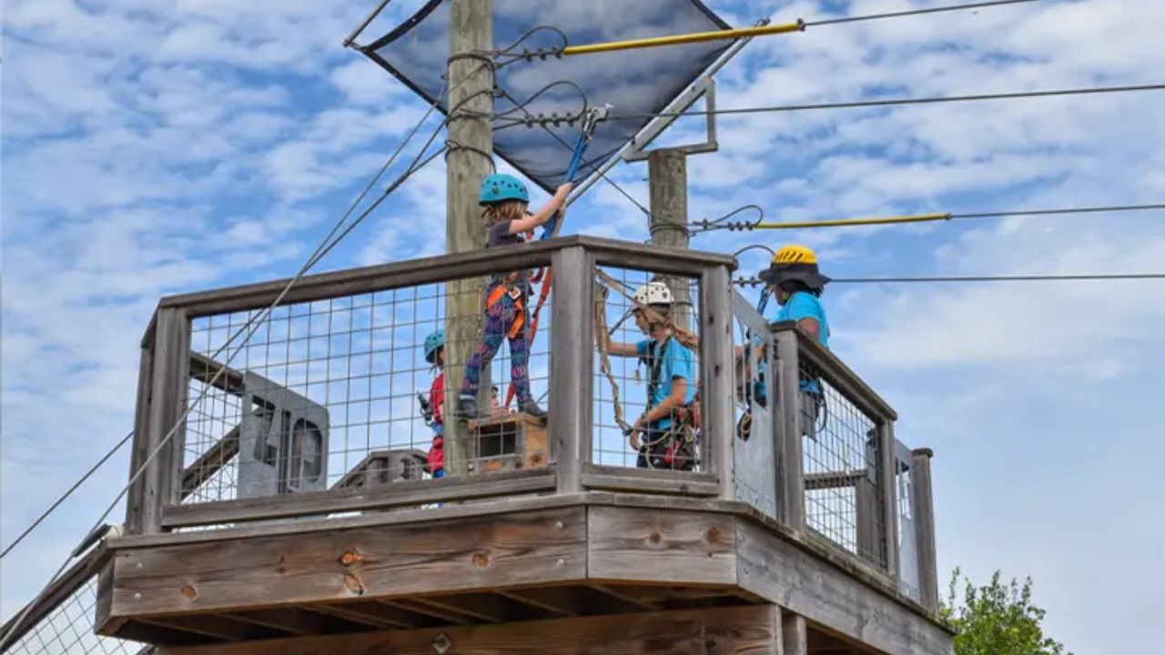 Kids smiling and having fun before the Little Zipper private zipline experience.