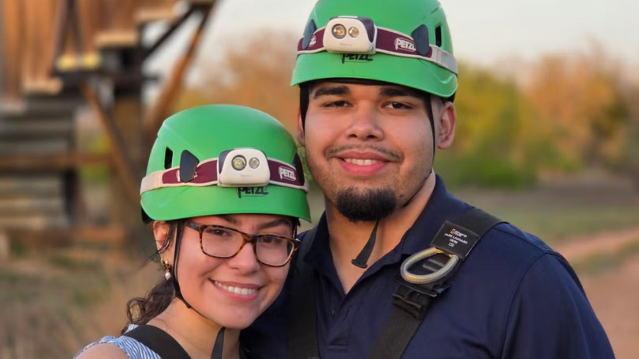 Happy couple posing at the Zip Lost Pines adventure park near Austin.