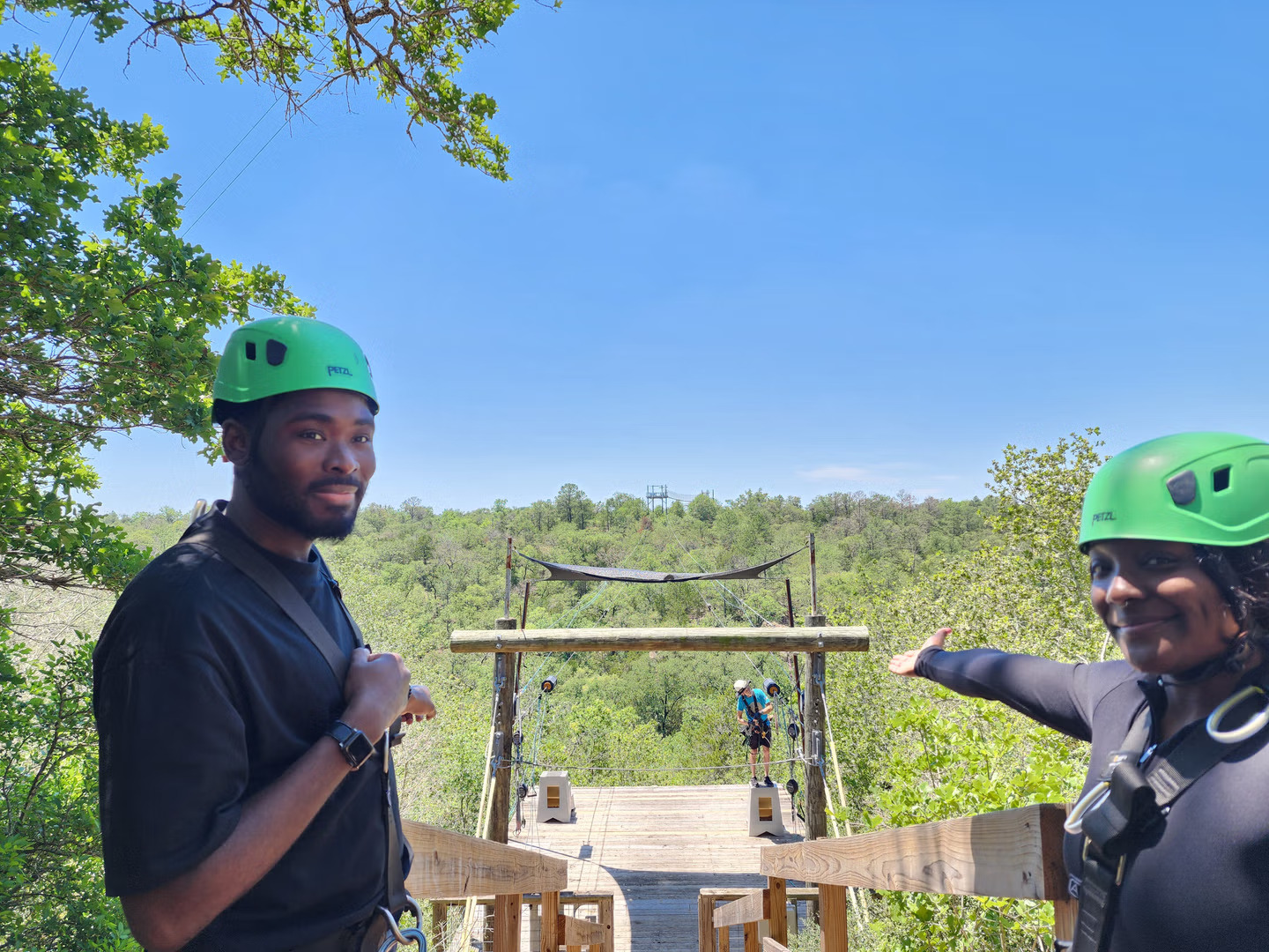 Couple enjoying a ziplining adventure at Zip Lost Pines