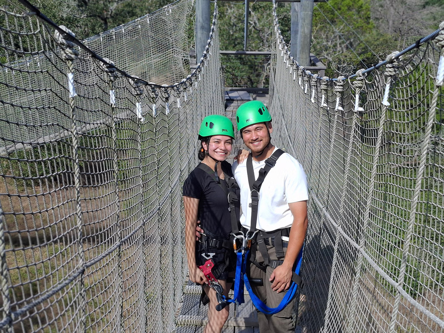 Couple enjoying an outdoor ziplining experience in Texas