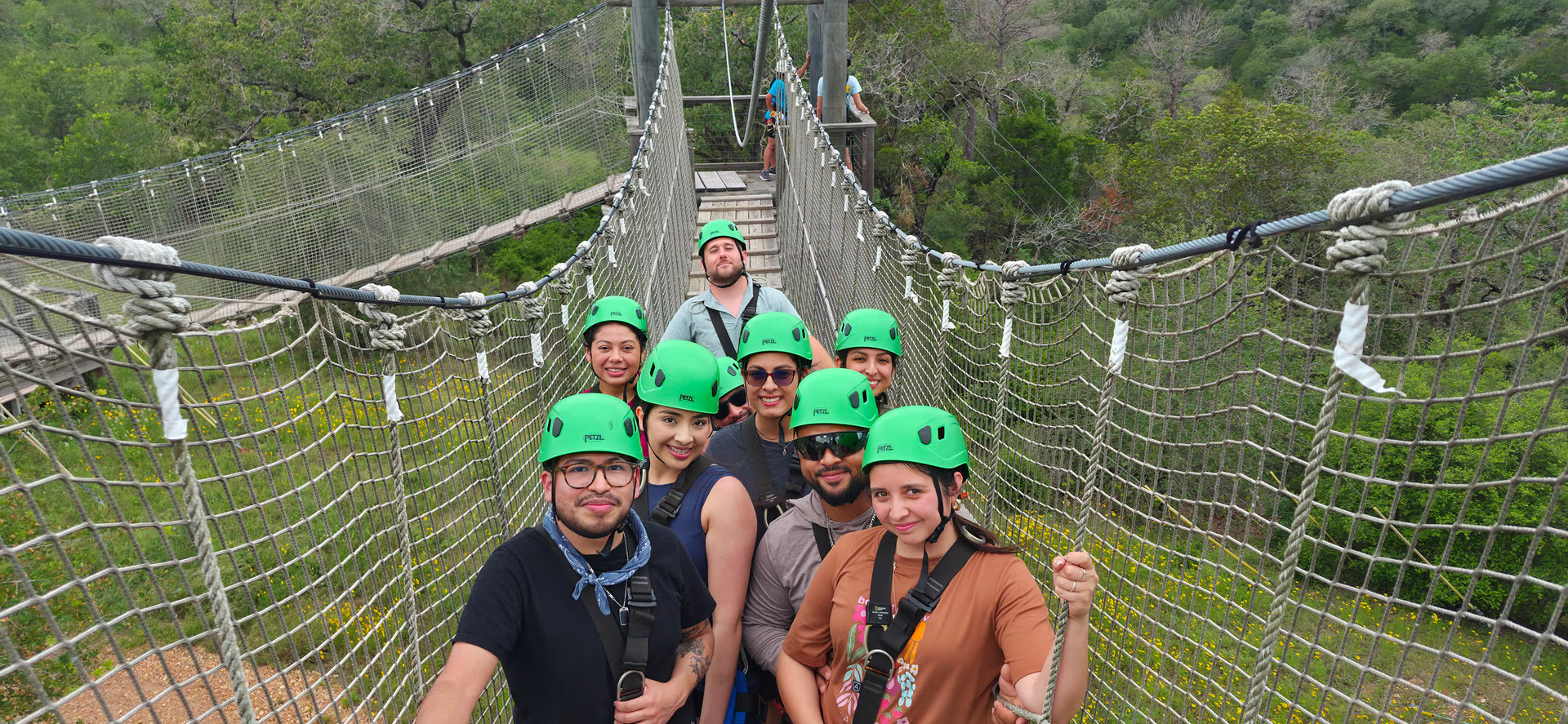 People enjoying a ziplining adventure at Zip Lost Pines